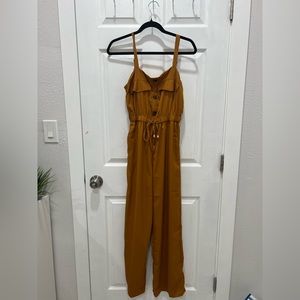 Super cute jumpsuit, dark orange. Never worn